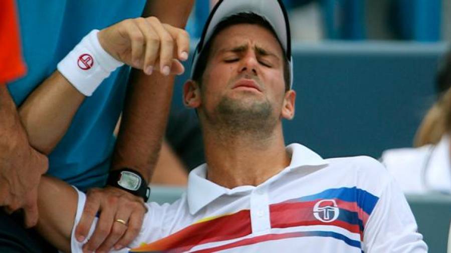 Foto correspondiente a agosto de 2011 cuando Dkjokovic se retiró de la final del Abierto de Cincinnati por dolores en su hombro. Foto: Efe