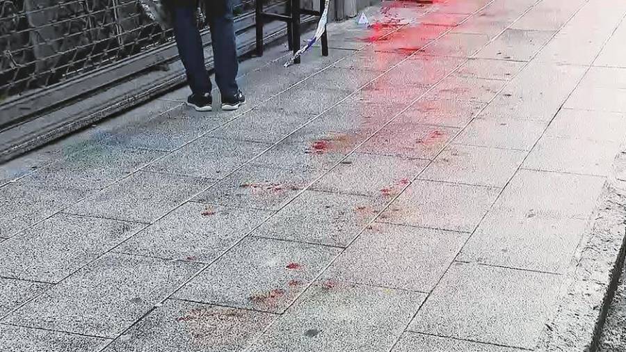 Un reguero de sangre en la rúa de Santiago de Chile