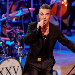 Robbie Williams en concierto. FOTO: Georg Wendt