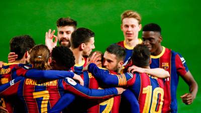 Los jugadores del Barcelona celebran el tanto anotado en la prórroga. Foto: AFP7