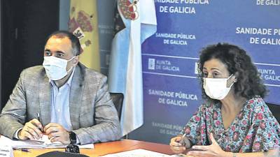 Julio García Comesaña y Carmen Durán, en la reunión de coordinación. Foto: Gallego