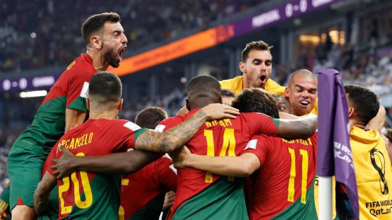 LOS JUGADORES de la selección portuguesa celebran un gol ante Ghana. Foto: DPA