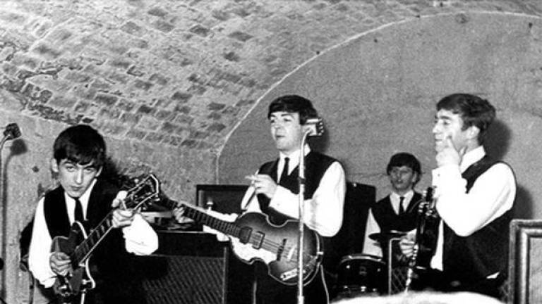 The Beatles durante su famosa actuación.