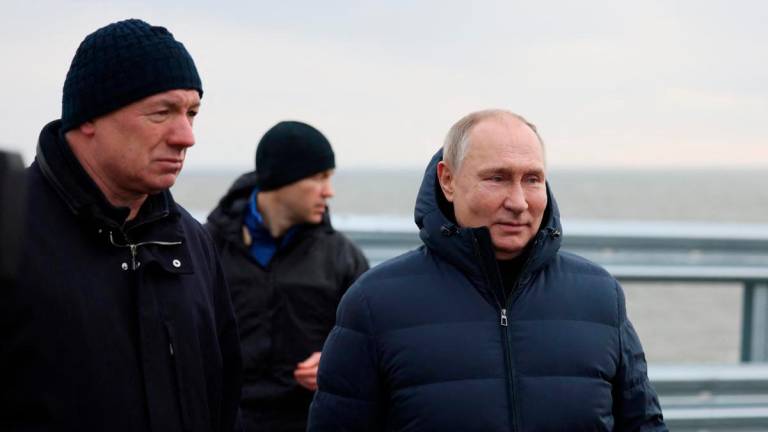 El presidente ruso, Vladímir Putin, visita el puente de Kerch que une la península de Crimea con Rusia, el pasado 5 de diciembre. Foto: Sputnik / Reuters