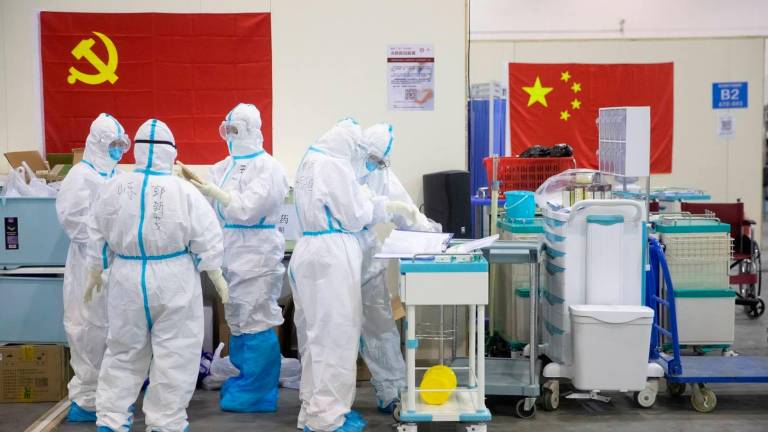 EN WUHAM. Sanitarios chinos al inicio de la pandemia Foto: Efe