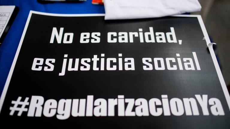 Uno de los carteles que se podía leer en la concentración en Madrid. Foto: Alejandro Martínez Vélez/E.P