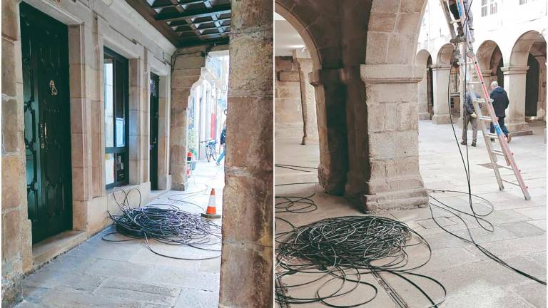 ACTUACIONES. Imágenes del cableado durante una de las instalaciones en las fachadas de la Rúa do Vilar. Foto: Cedida 