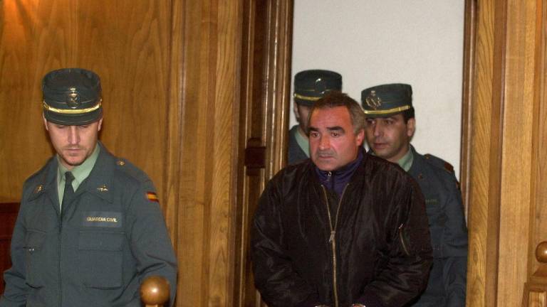 Alfredo Sánchez Chacón, escoltado por la Guardia Civil, en una foto de archivo. EFE