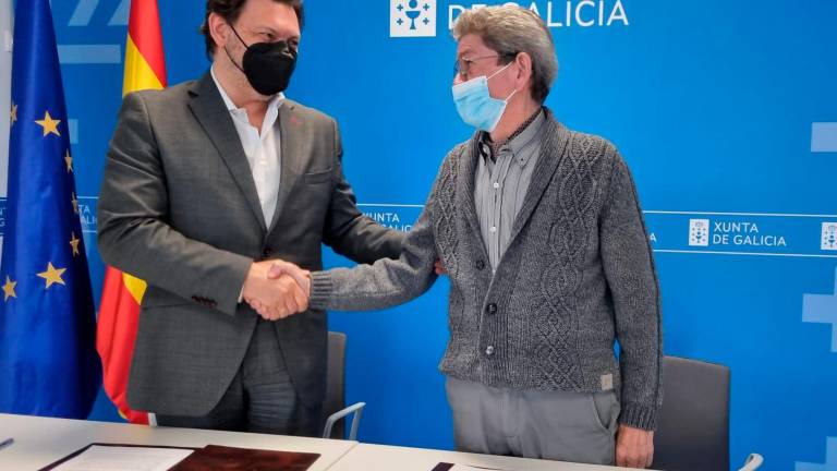 Antonio Rodríguez e Celso Domínguez trala firma do convenio