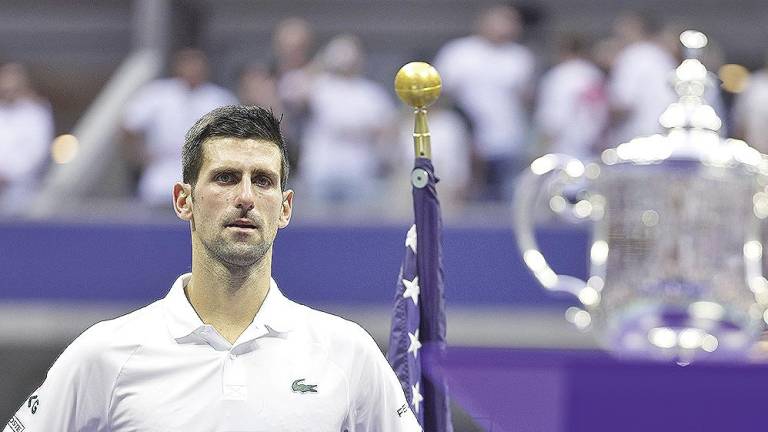 Novak Djokovic durante la ceremonia de trofeos del US Open. Foto: Lane