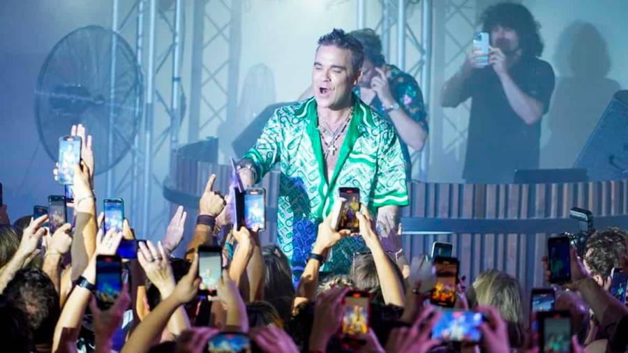 directo. Robbie Williams, durante uno de sus conciertos en España