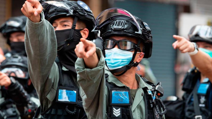 Agentes de la Policía de Hong Kong durante una protesta. FOTO; Jayne Russell