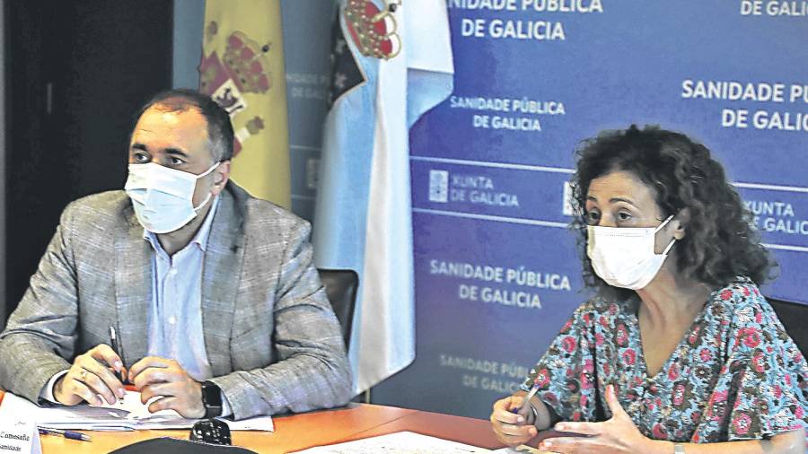 Julio García Comesaña y Carmen Durán, en la reunión de coordinación. Foto: Gallego