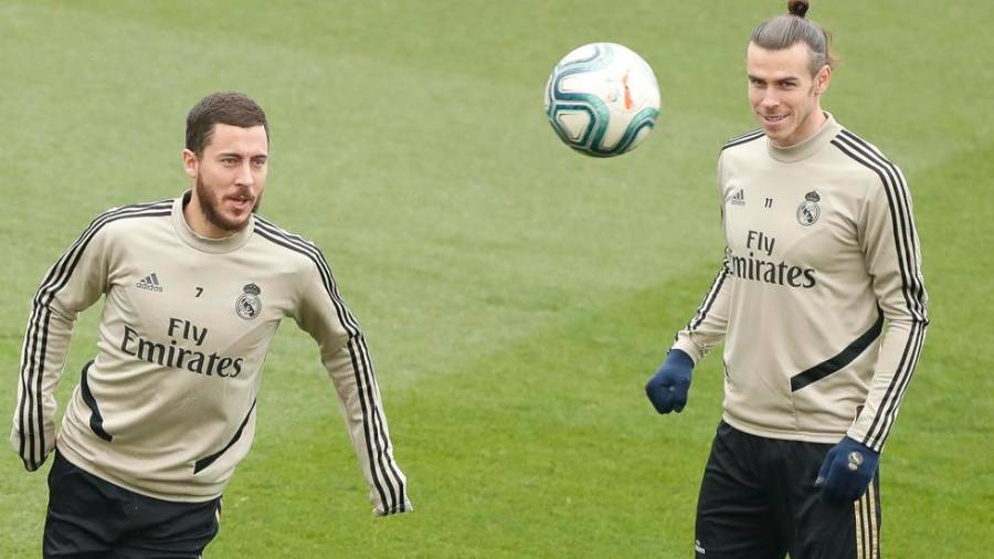 cara y cruz hazard (izquierda) y Bale en un pasado entrenamiento del Madrid. Foto: Efe 